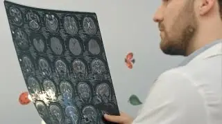 Senior Man Doctor Examines MRI Image In Hospital | Stock Footage - Videohive