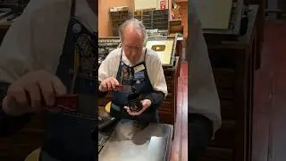 Rolling some black rubber base ink  out to get ready for some letterpress printing.