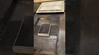Using a printing press to print a halftone picture of a printing press.