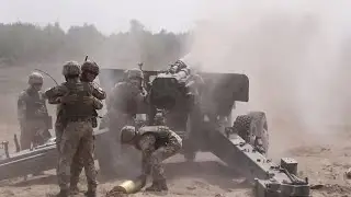 Украинские солдаты обнимаются с американскими на военных учениях в Польше