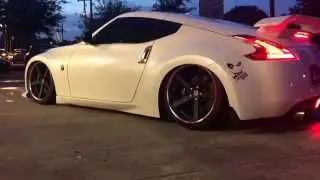 EDD Graphics 370Z bagged on CVT Designs air suspension with custom hardline