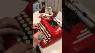 Typing a message on a 1950s Smith-Corona typewriter for National Typewriter Day (June 23)