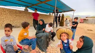 Rural family. The children's joy in spending time with Jan Bibi and continuing to build the house.